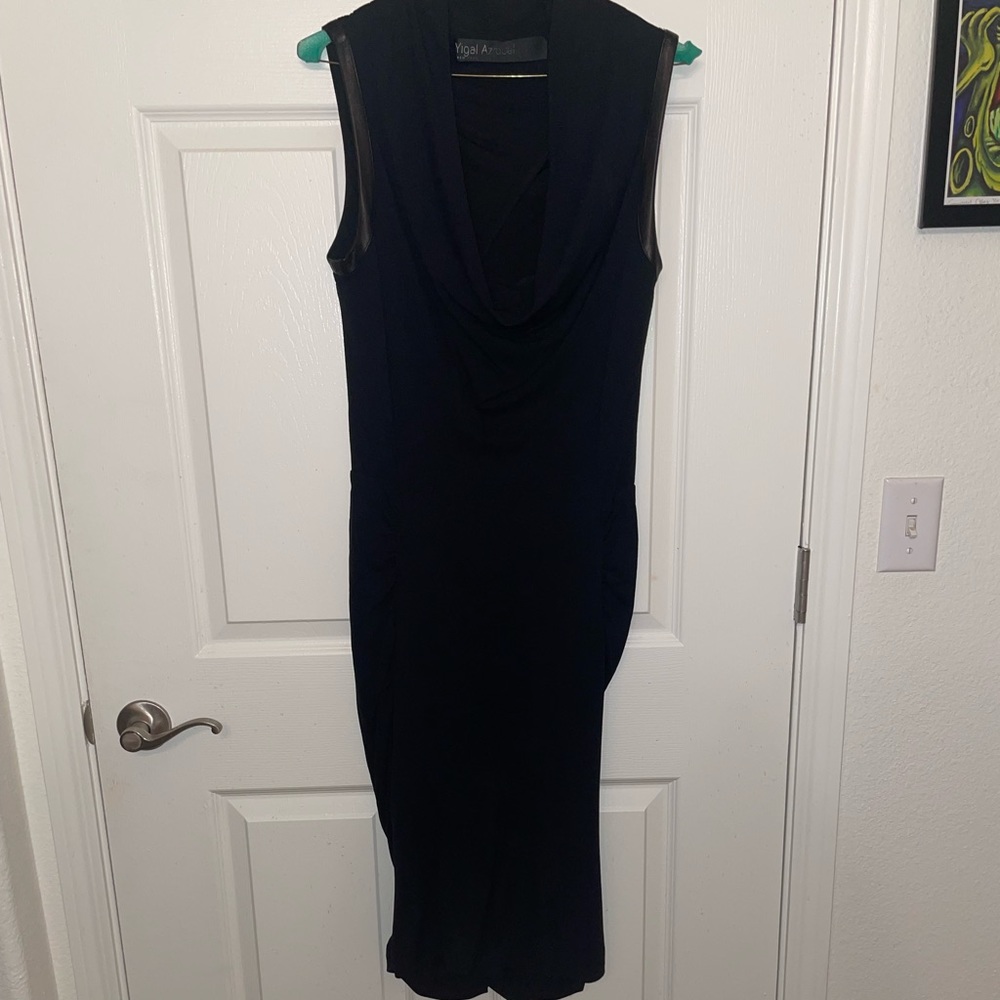 Long black dress with the most interesting patterns. Very flattering